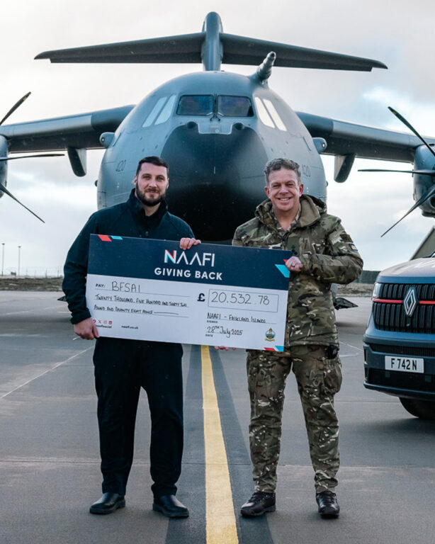 NAAFI giving back cheque for BFSAI Falkland Islands